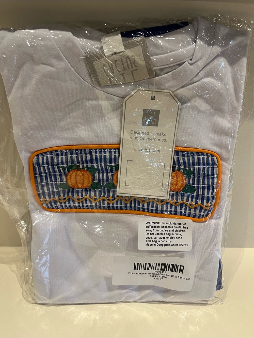 Lil Cactus White Short-Sleeve Tee with Pumpkin Smocked and blue pants